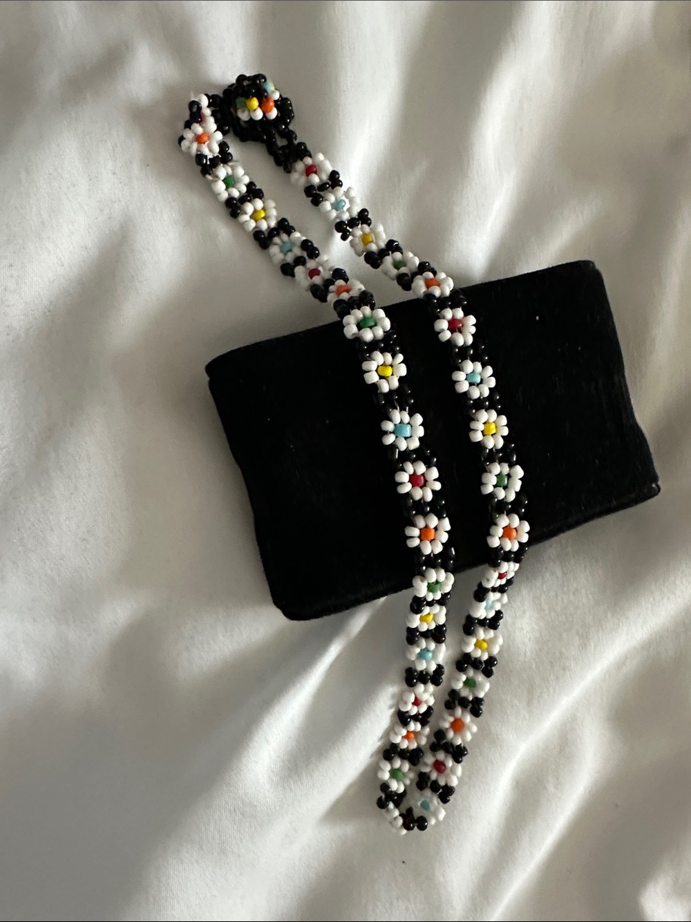 Handmade Black Beaded Necklace with Multicolor Daisy Accents
